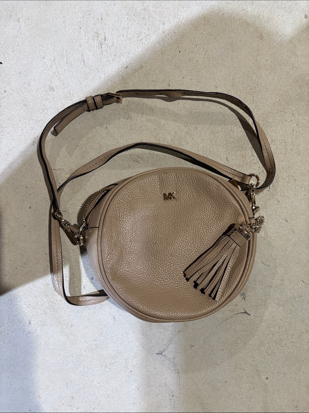 Michael Kors Taupe Pebbled Leather Round Crossbody with Tassel